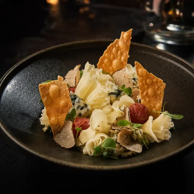 Illustrative truffle and cheese small plate with crisp wonton